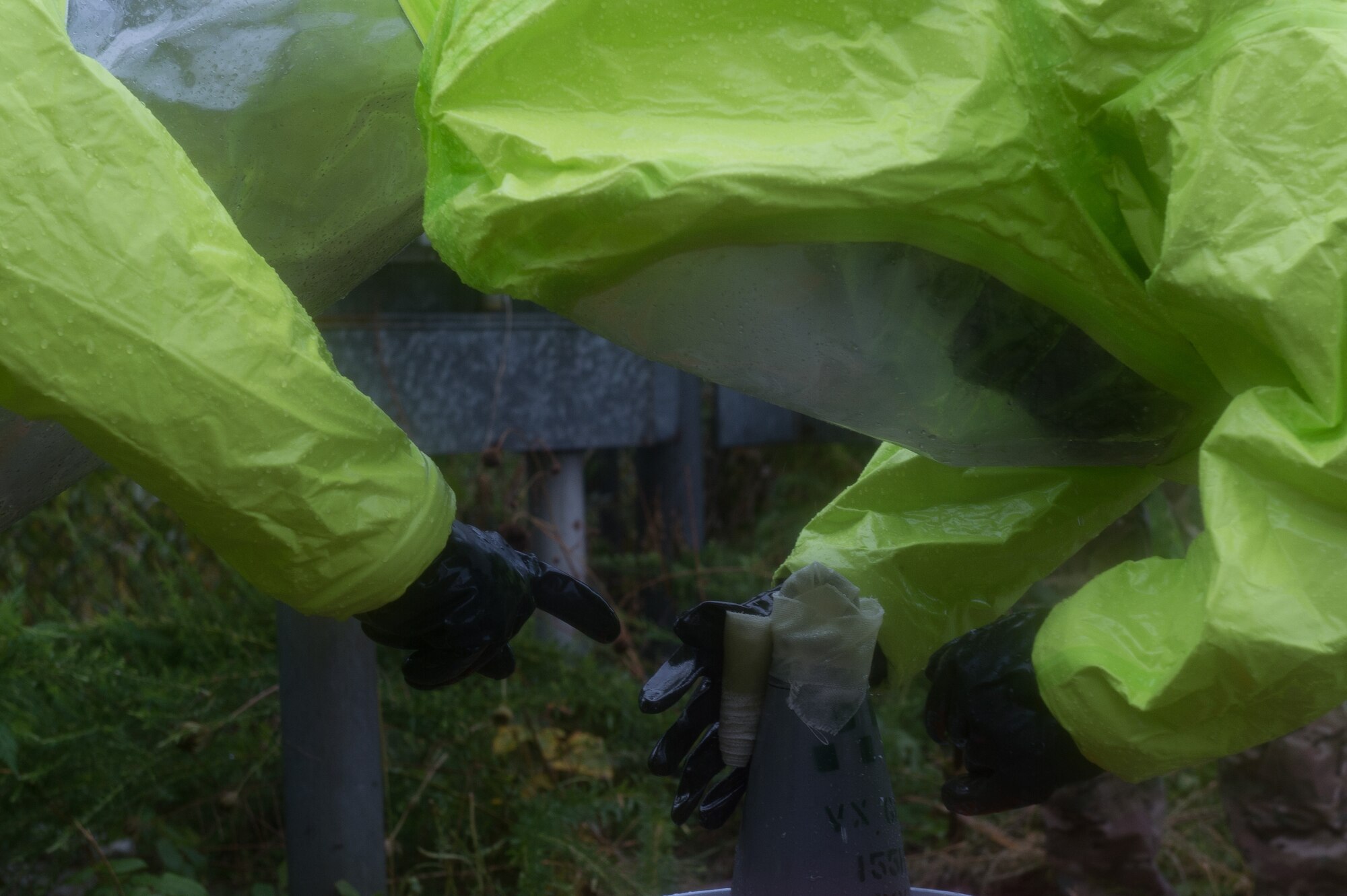 U.S. Air Force Airmen assigned to the 11th Civil Engineer Squadron Explosive Ordinance Disposal flight, participates in a chemical training scenario during Operation Llama Fury 3.0 at Joint Base Langley-Eustis, Va., Aug. 8, 2016.