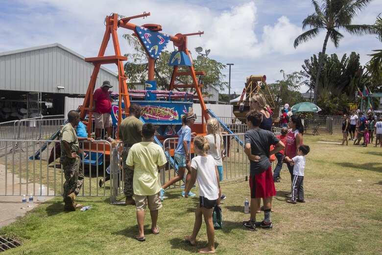 Marine Corps Base Hawaii residents and their children attend the Klipper Summer Bash at the Klipper Golf Course aboard Marine Corps Base Hawaii, July 28, 2017. The Summer Bash is an annual event hosted by the Klipper Golf Course to strengthen a sense of community amongst residents of MCB Hawaii. (U.S. Marine Corps photo by Lance Cpl. Isabelo Tabanguil)