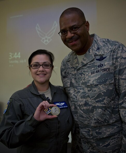 932nd Commander commends great service and educational briefing with commander's coin.