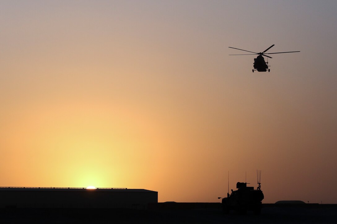 An Afghan Air Force Mi-17 Helicopter prepares to land at Camp Shorabak, Afghanistan during casualty evacuation training Aug. 14, 2017. More than 30 Afghan National Army soldiers with 215th Corps rehearsed and refined their CASEVAC process in preparation for future real-world missions. Quickening the CASEVAC process greatly enhances the survivability and recovery rates for wounded personnel. (U.S. Marine Corps photo by Sgt. Lucas Hopkins)