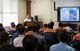 Mitsuo Yamaguchi, 18th Civil Engineer Squadron fire training officer, briefs local firefighters during a training visit, Aug. 14, 2017, at Kadena Air Base, Japan. More than 50 local firefighters visited Kadena to observe how Kadena's firefighters respond during fire emergencies. (U.S. Air Force photo by Naoto Anazawa)