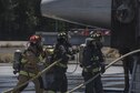 U.S. Air Force 18th Civil Engineer Squadron firefighters conduct annual hands-on fire training August 14, 2017, at Kadena Air Base, Japan. Okinawan firefighters conduct live fire training annually with 18th CES firefighters to help maintain readiness for Team Kadena and Okinawa in case of emergencies. (U.S. Air Force photo/ Airman 1st Class Greg Erwin)