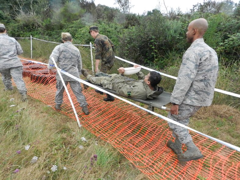 Members of team eight participate in a leadership course as part of a two-day field exercise during the 23rd Annual International Junior Officer Development (IJOLD) course, held in Rochefort Air Base, France, July 22-29. IJOLD is designed to enhance and develop leadership skills, cultural understanding and military doctrine of NATO nations.