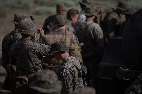 U.S. Marines with 2d Battalion, 8th Marine Regiment, 2d Marine Division receive water from the water trailer during Mountain Training Exercise 4-17 at Mountain Warfare Training Center, August 6, 2017. Marines with Combat Logistics Battalion 5, Combat Logistics Regiment 1, 1st Marine Logistics Group, support 2d Battalion, 8th Marines logistically by tackling the technical aspects of mountainous and cold weather operations by providing them chow, water, and fuel. The water trailer can hold up to 600 gallons of water and serves as the primary source of water to Marines in the field. (U.S. Marine Corps photo by Lance Cpl. Timothy Shoemaker)