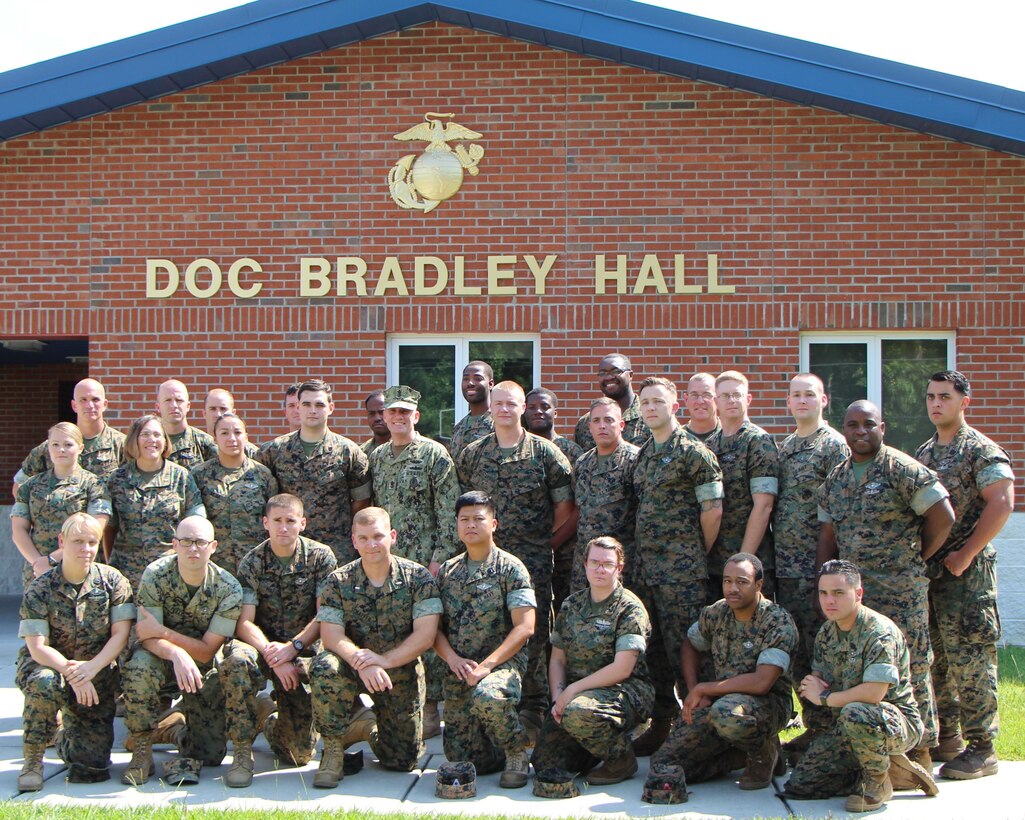 MCPON Giordano takes time for a group photo with the staff at Field Medical training Battalion-East.