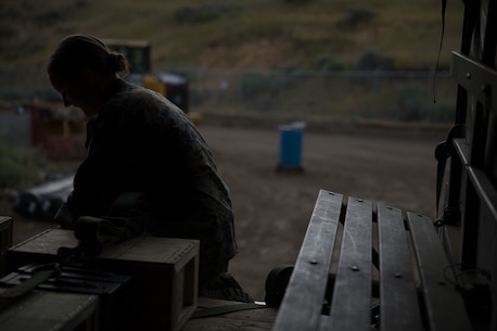 U.S. Marine Pfc. Olivia Rutherford, an ammunition technician with Combat Logistics Battalion 5, Combat Logistics Regiment 1, 1st Marine Logistics Group, uses a strap to tie down ammo during a field operation while participating in Mountain Training Exercise 4-17 at Marine Corps Mountain Warfare Training Center, August 3, 2017. Marines who handle ammunition and explosives must meet the criteria to be qualified and certified by Marine Corps standards. (U.S. Marine Corps photo by Lance Cpl. Timothy Shoemaker)