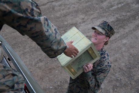 U.S. Marine Pfc. Olivia Rutherford, an ammunition technician with Combat Logistics Battalion 5, Combat Logistics Regiment 1, 1st Marine Logistics Group, carries a box of 5.56 blank ammunition during Mountain Training Exercise 4-17 at Marine Corps Mountain Warfare Training Center, August 3, 2017. Marines with CLB-5 participating in the Mountain Training Exercise received more than 9,000 rounds of blank ammunition. (U.S. Marine Corps photo by Lance Cpl. Timothy Shoemaker)