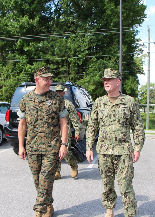 HMCM DesChamps, FMTB-E CMC, welcomes MCPON Giordano on his tour of Field Medical Training Battalion-East.