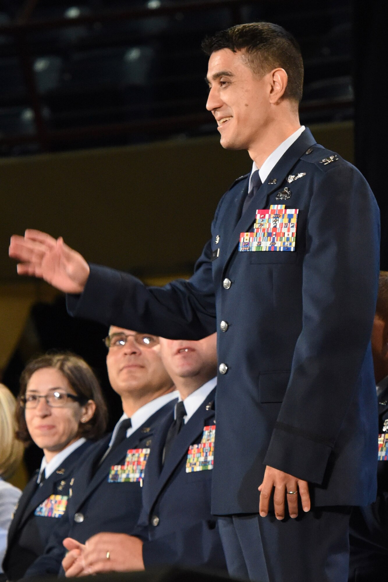 U.S. Air Force Col. Ricky Mills, 17th Training Wing commander, stands for recognition during the annual convocation of the San Angelo Independent School District at the Foster Communications Colosseum, San Angelo, Texas, Aug. 15, 2017.