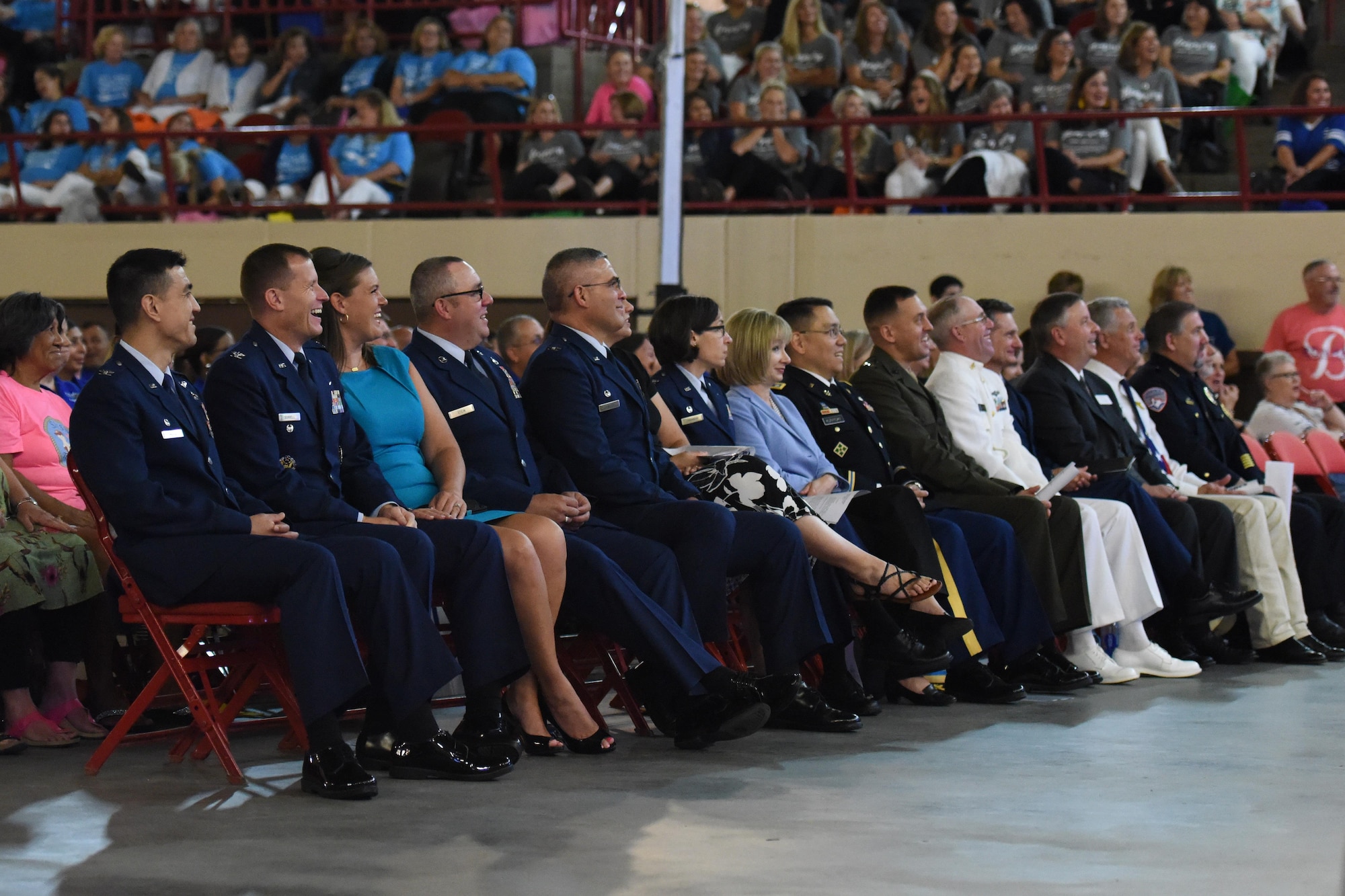 U.S. Air Force Col. Ricky Mills, 17th Training Wing commander, joins the 17th Training Wing, 17th Training Group, 17th Medical Group, 17th Mission Support Group, Army, Marine Corps and Navy leaders at the annual convocation of the San Angelo Independent School District at the Foster Communications Colosseum, San Angelo, Texas, Aug. 15, 2017.