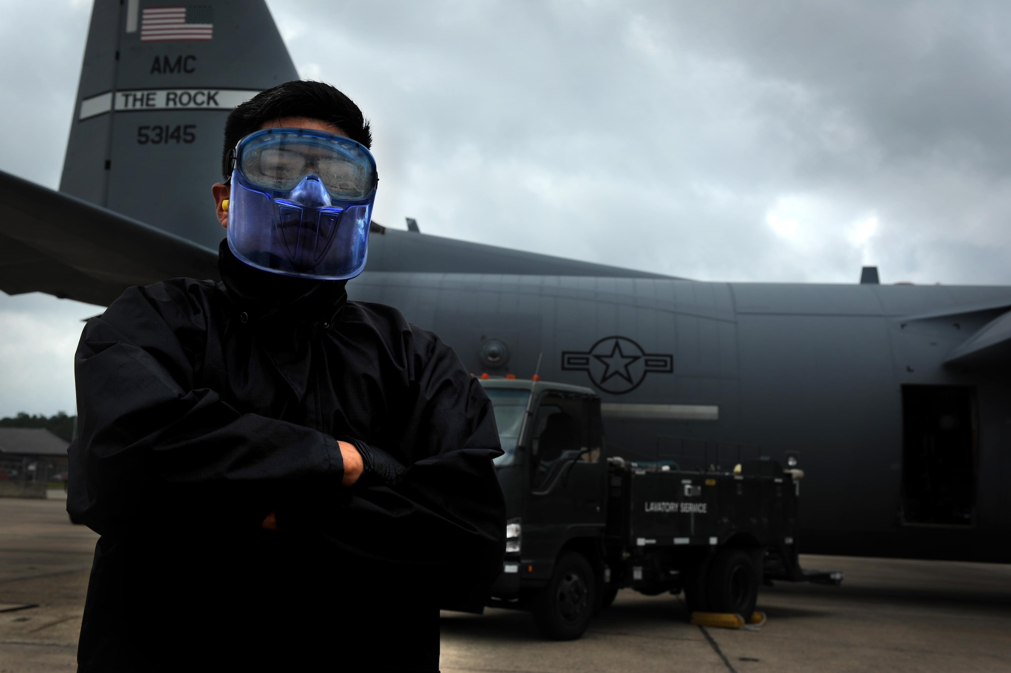 Airman 1st Class Jose Chala, 19th Logistics Readiness Squadron Fleet Services element member, operates a lavatory services truck to dispose of solid waste from a C-130J Aug. 16, 2017, at Little Rock Air Force Base, Ark. The team services approximately 25 aircraft daily, including transient aircraft. (U.S. Air Force photo by Airman 1st Class Grace Nichols)