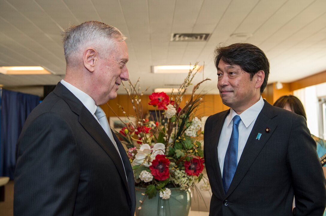 Defense Secretary Jim Mattis, left, greets Japanese Defense Minister Itsunori Onodera at the State Department.