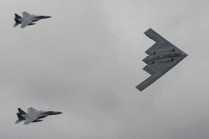 Three aircraft fly in formation