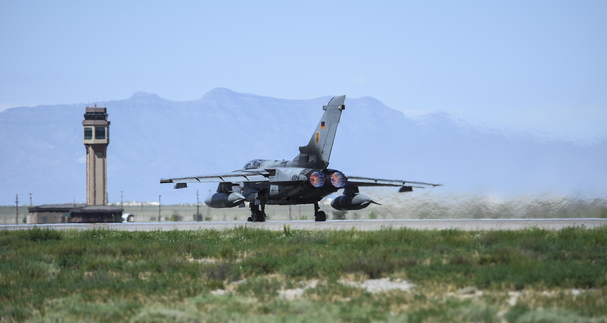 A German air force Tornado aircraft and an F-16 Fighting Falcon perform a final joint flying mission at Holloman Air Force Base, N.M., Aug. 17, 2017. The German air force has entered its final stage of departure, however they are not expected to complete their departure from Holloman AFB until mid 2019. (U.S. Air Force photo by Staff Sgt. Stacy Jonsgaard)