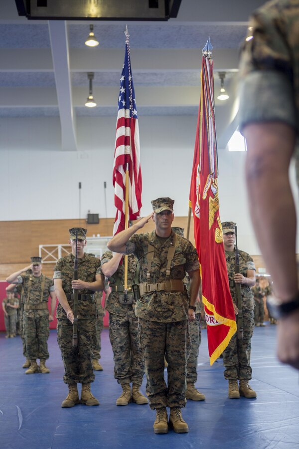 U.S. Marines with 5th Air Naval Gunfire Liaison Company (ANGLICO) and their families attend a change of command ceremony on Camp Hansen, Okinawa, Japan, June 16, 2017. LtCol. Bradley S. Cowley has been relinquished as commanding officer of 5th ANGLICO by LtCol. Timothy M. Slinger. (U.S. Marine Corps photo by MCIPAC Combat Camera Lance Cpl. Jesula Jeanlouis)
