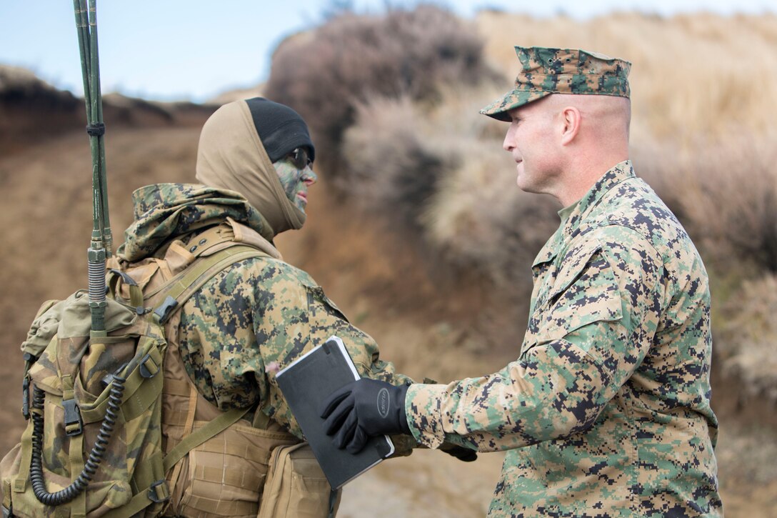 U.S. Marines and Sailors with 5th Air Naval Gunfire Liaison Company, III Marine Headquarters Group, III Marine Expeditionary Force, embark on a field exercise with the New Zealand Army 16th Field Artillery Regiment at Waiouru Military Training Facility, Waiouru, New Zealand, July 26, 2017. The purpose of this exercise is to improve U.S. and NZ targeting and fire support familiarization and interoperability. (U.S. Marine Corps photo by MCIPAC Combat Camera Lance Cpl. André T. Peterson)
