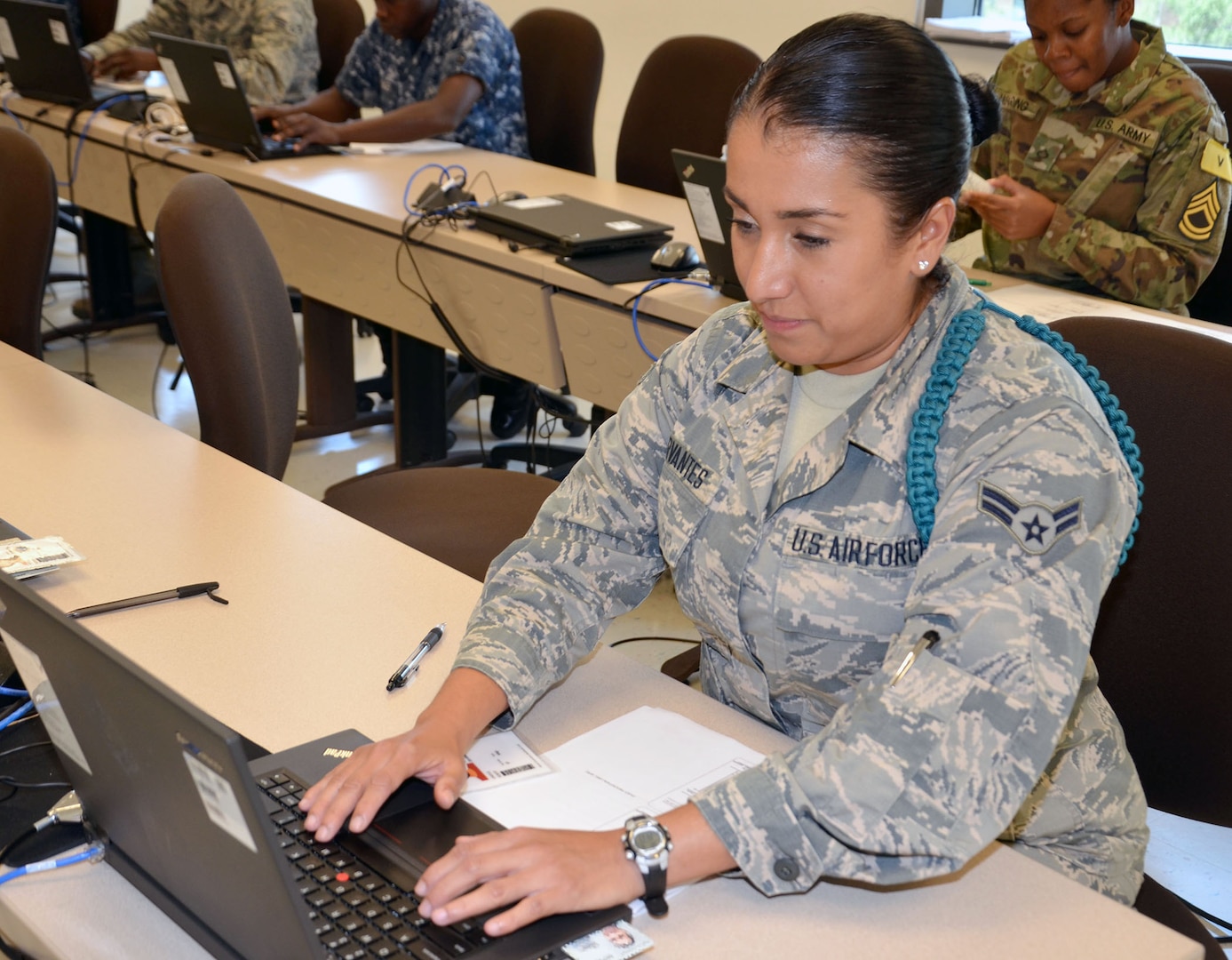 Airman 1st Class Amanda Cervantes, a student in the Medical Education and Training Campus Pharmacy Technician program on Joint Base San Antonio-Fort Sam Houston, Texas, conducts a mock exam to learn how to use the Composite Health Care System database. "Mock" exams test the skills that the students have learned to prepare them not only for the graded exam, but for what they will see in the clinical training phase and eventually in their permanent duty station.  Cervantes, a widow with four children, joined the Air Force Reserve to set an example for her children, serve her country, and work in the medical field so she can help people.