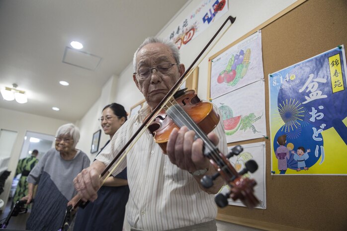 Americans dance with Japanese locals to honor ancestors