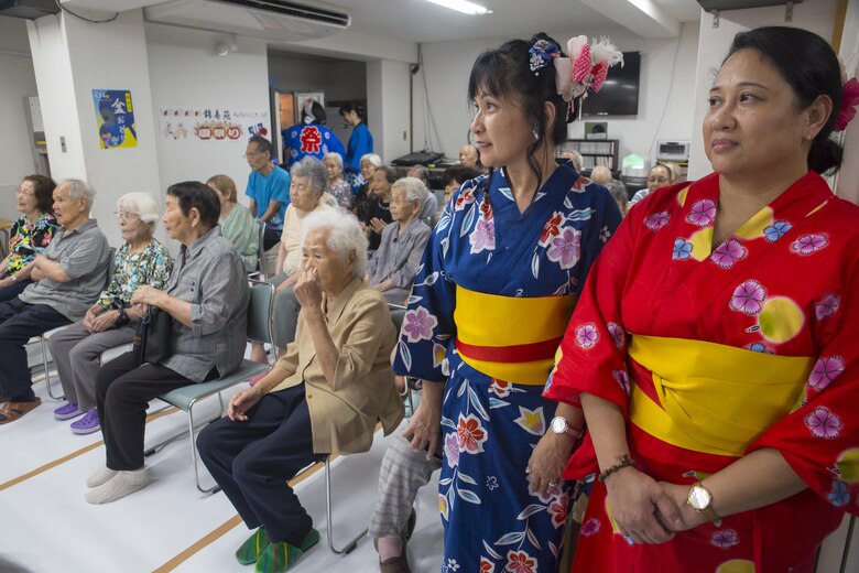 Americans dance with Japanese locals to honor ancestors