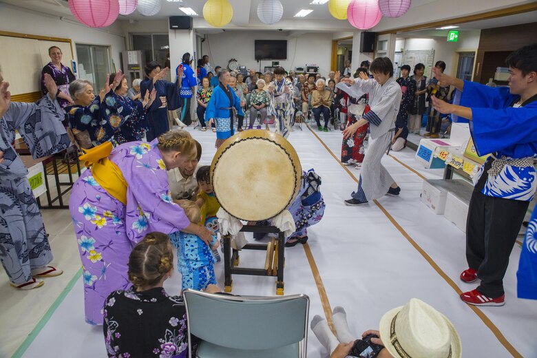 Americans dance with Japanese locals to honor ancestors