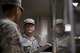 Technical Sgt. Jeremy Hussey, 374th Public Health force health management section chief, mentors Airman 1st Class Dionel Alconaba, 374 PH/FHM technician, on the proper way to perform a routine health inspection, Aug. 8, 2017, at Yokota Air Base, Japan. Routine food facility inspections are to ensure facilities providing food to members of Team Yokota are maintaining proper health procedures and security. (U.S. Air Force photo by Airman 1st Class Donald Hudson)