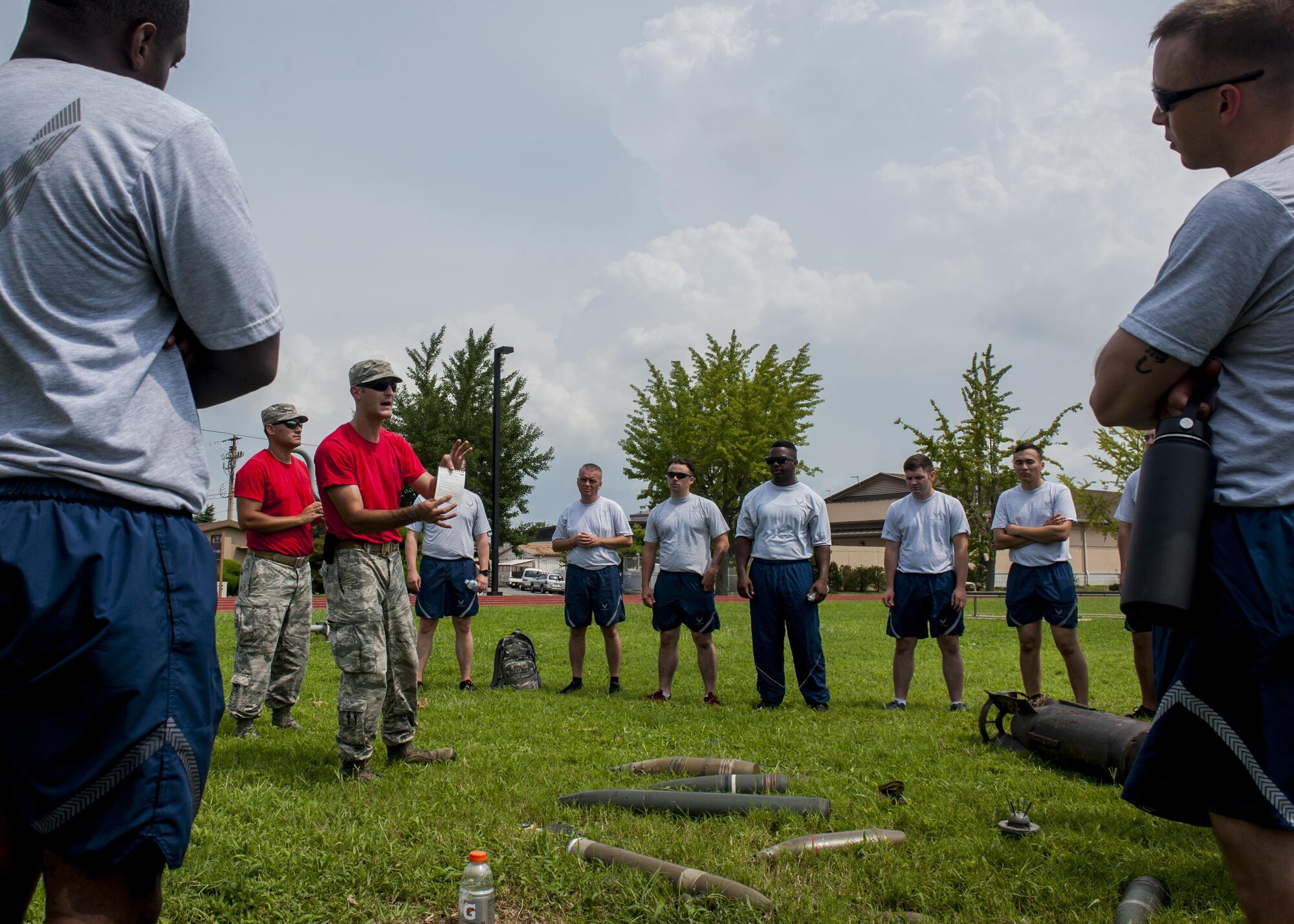 U.S. Air Force Airmen assigned to the 8th Fighter Wing, practice identifying unexploded ordinance during a wing training day at Kunsan Air Base, Republic of Korea, Aug. 18, 2017. The event, hosted by the 8th Civil Engineer Squadron Readiness and Emergency Management Flight, taught Airmen vital skills in the event of an emergency situation. (U.S. Air Force photo by Senior Airman Colville McFee)