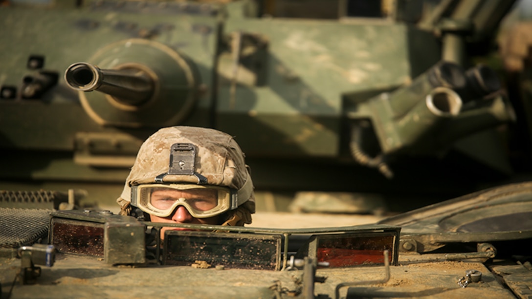 Lance Cpl. Dakota Yates waits for the light armored vehicle convoy to depart the command post Aug. 16, 2017 in Hokudaien, Japan, during Northern Viper 17. The service members participated in a live-fire exercise and assaulted the target by cover and maneuver, and suppressed fire from Japanese tanks and U.S. light armored vehicles. The U.S. has a vested interest in a secure Pacific; combined-joint exercises enhance regional cooperation between participating nations to collectively deter security threats. Yates, a Miltown, Indiana native, is an LAV driver with 3rd Light Armored Reconnaissance Battalion attached to 3rd Marine Division through the unit deployment program.
