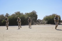 Recruits from Charlie Company, 1st Recruit Training Battalion, run to the first obstacle during the Bayonet Assault Course at Marine Corps Recruit Depot San Diego, Aug. 8.
