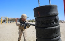 A recruit of Charlie Company, 1st Recruit Training Battalion, conducts a straight thrust technique during the Bayonet Assault Course at Marine Corps Recruit Depot San Diego, Aug. 8.