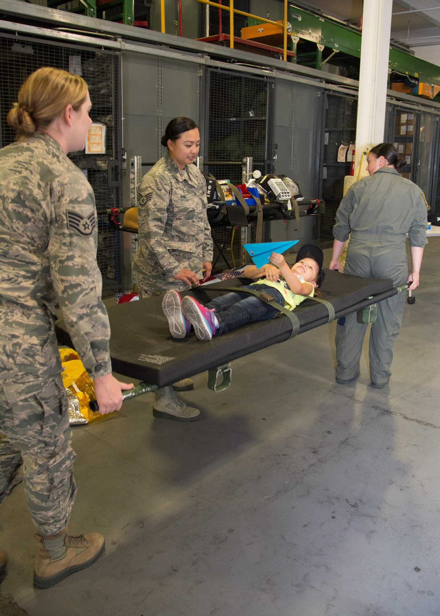349th Air Mobility Wing Airmen and their family members participate in Operation Family Circle Aug. 12, 2017, at Travis Air Force Base, Calif.