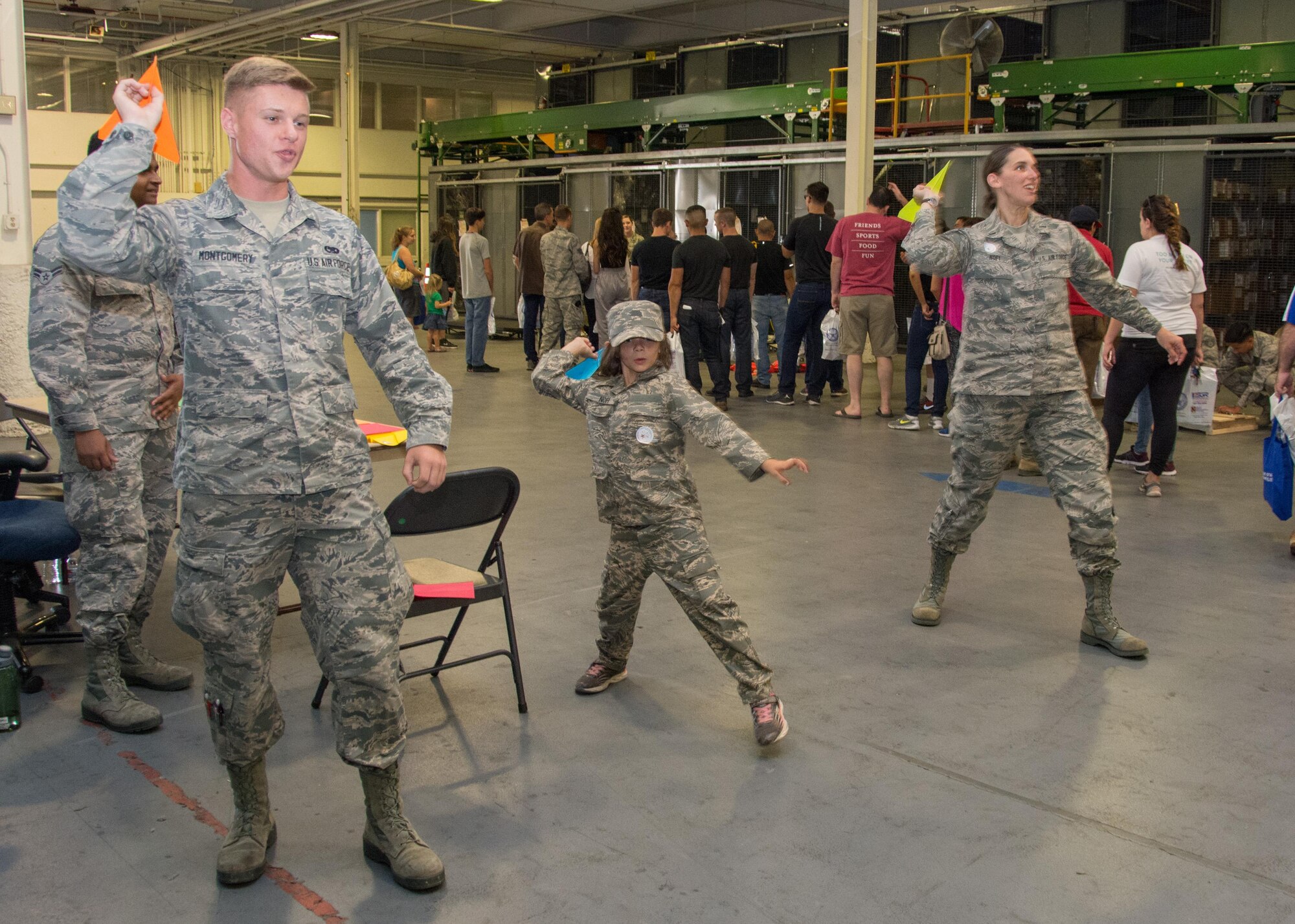 349th Air Mobility Wing Airmen and their family members participate in Operation Family Circle Aug. 12, 2017, at Travis Air Force Base, Calif.
