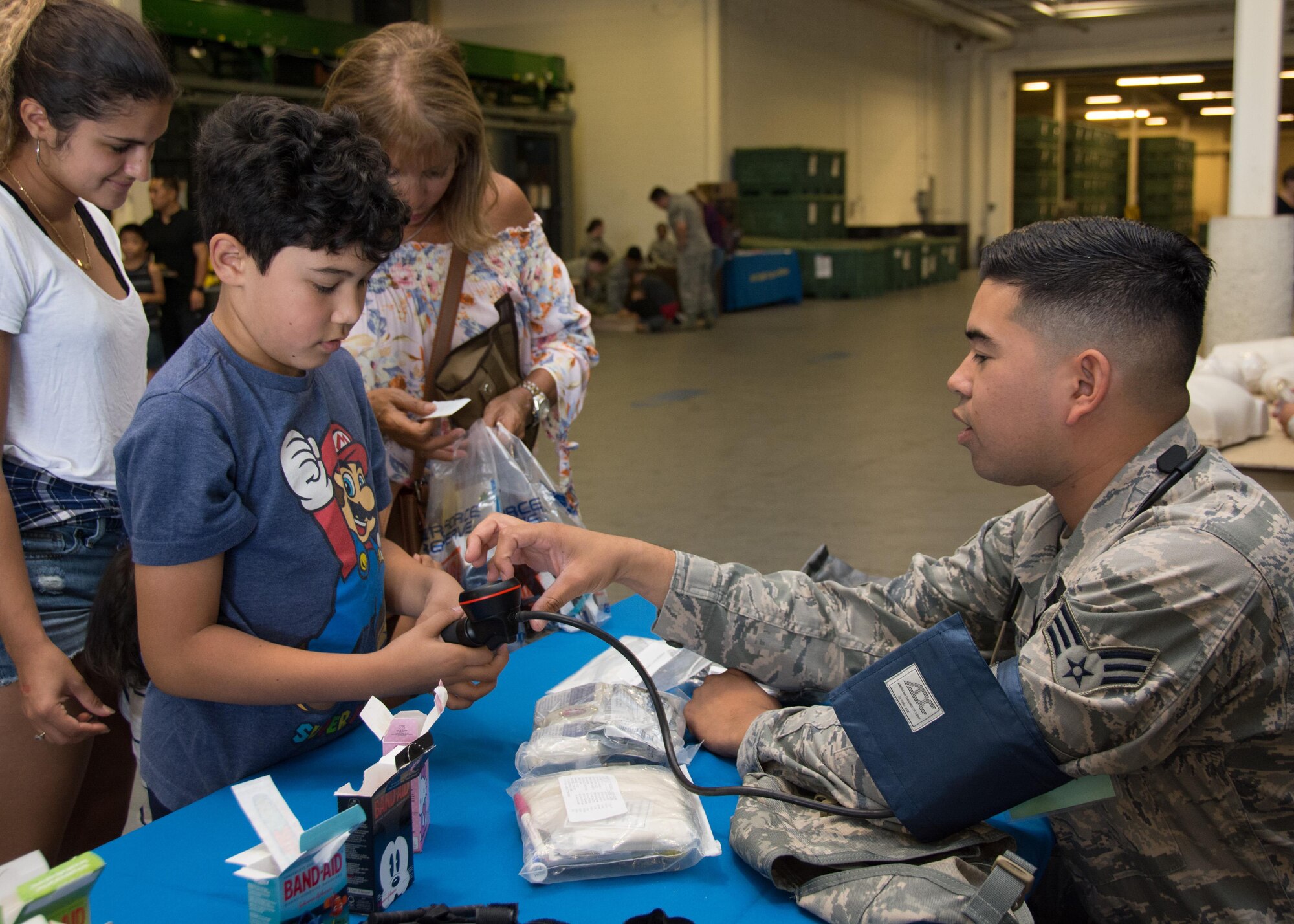 349th Air Mobility Wing Airmen and their family members participate in Operation Family Circle Aug. 12, 2017, at Travis Air Force Base, Calif.