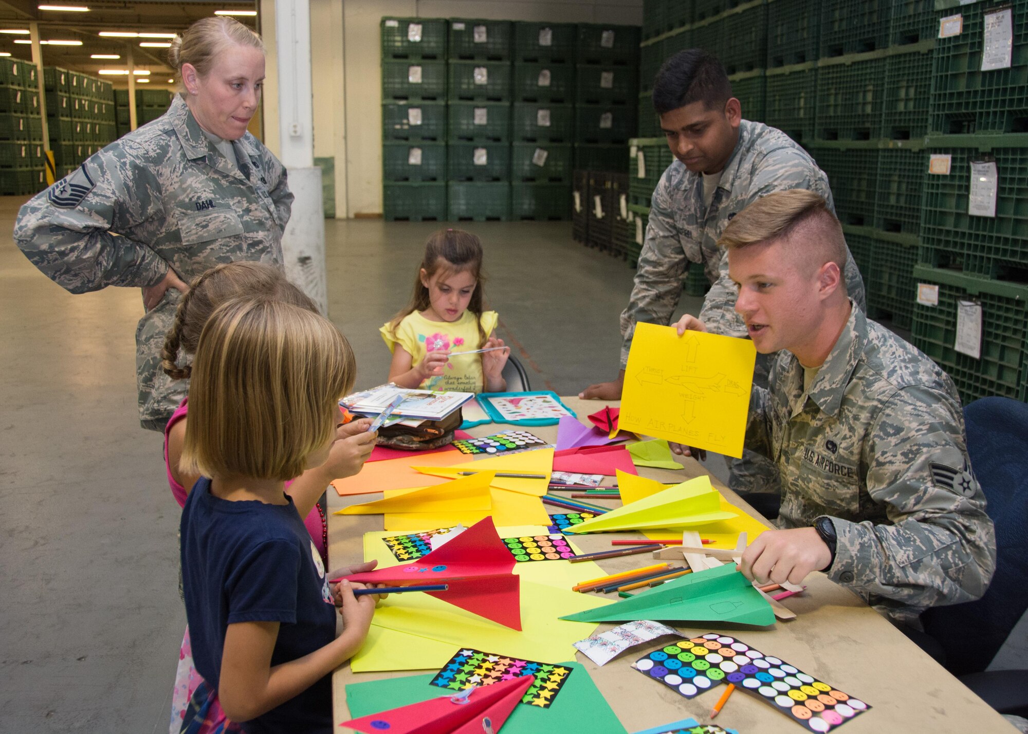 349th Air Mobility Wing Airmen and their family members participate in Operation Family Circle Aug. 12, 2017, at Travis Air Force Base, Calif.