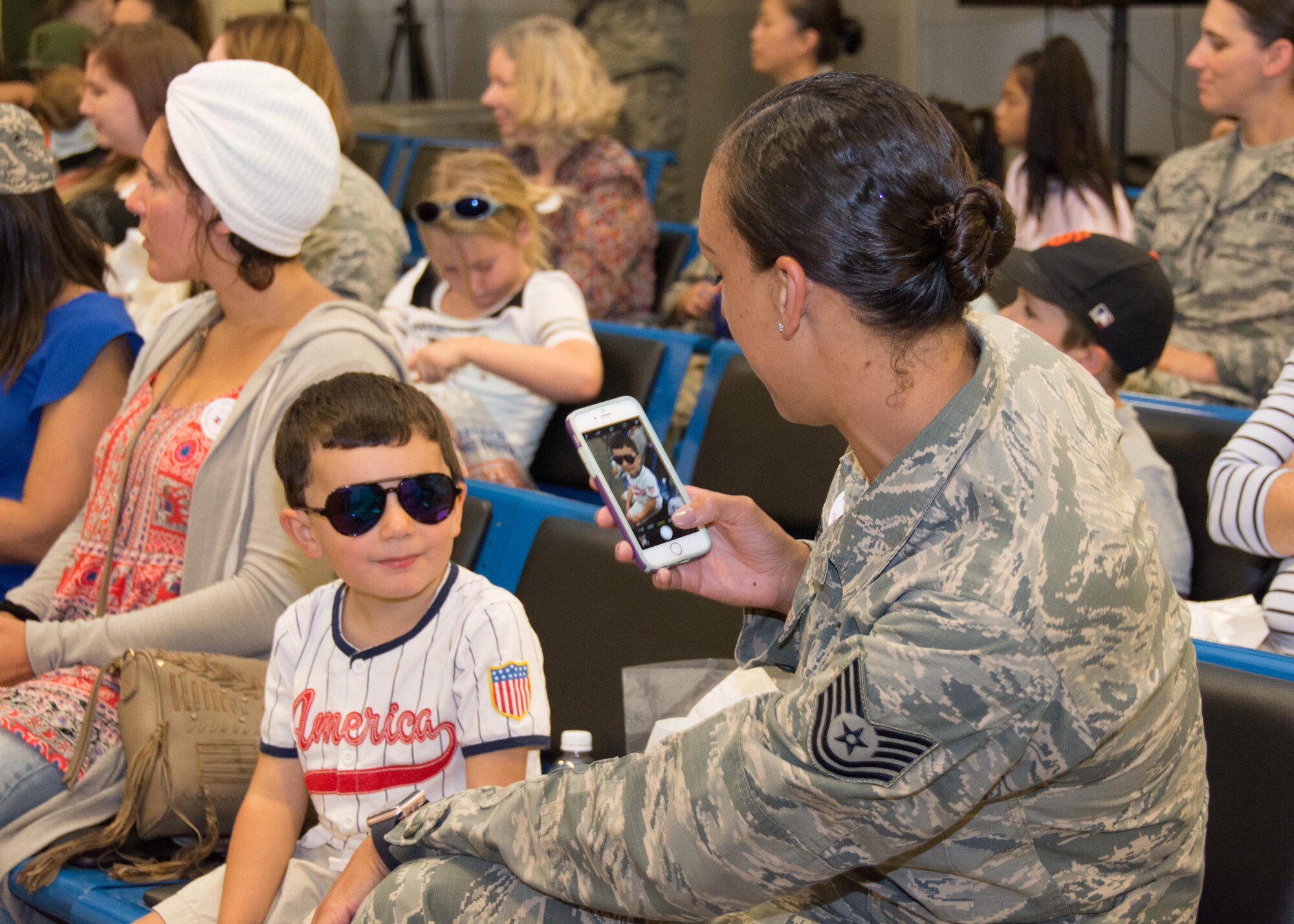 349th Air Mobility Wing Airmen and their family members participate in Operation Family Circle Aug. 12, 2017, at Travis Air Force Base, Calif.