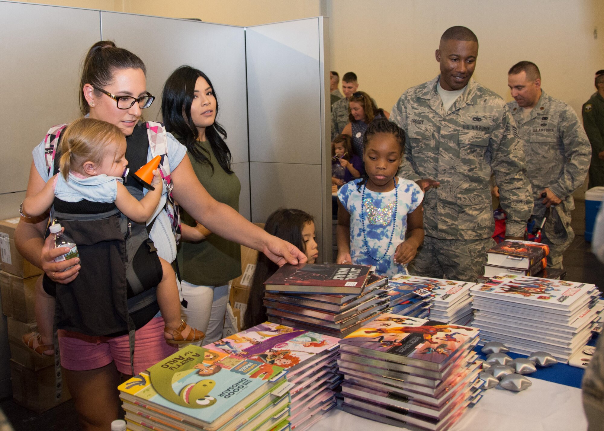 349th Air Mobility Wing Airmen and their family members participate in Operation Family Circle Aug. 12, 2017, at Travis Air Force Base, Calif.