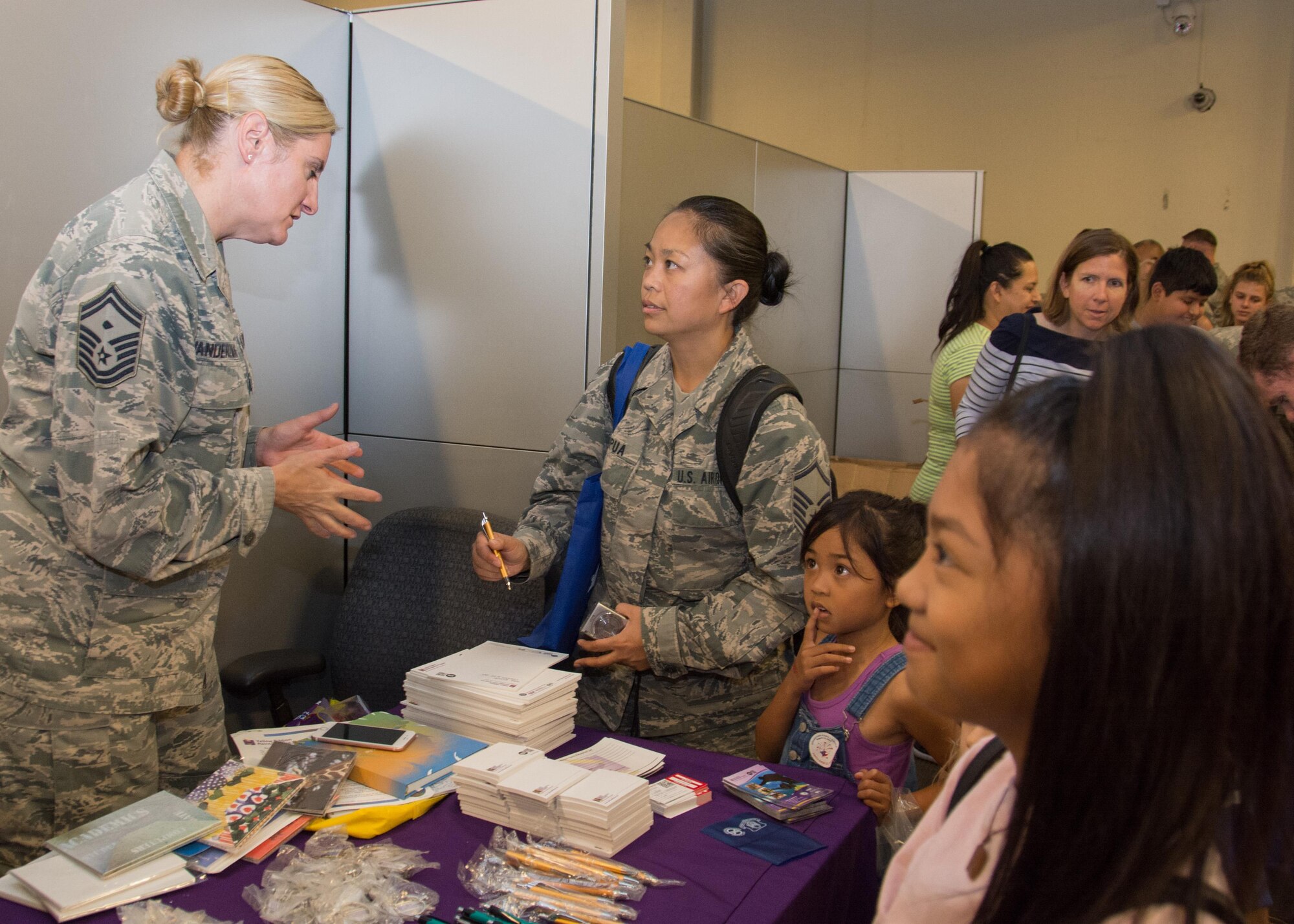 349th Air Mobility Wing Airmen and their family members participate in Operation Family Circle Aug. 12, 2017, at Travis Air Force Base, Calif.
