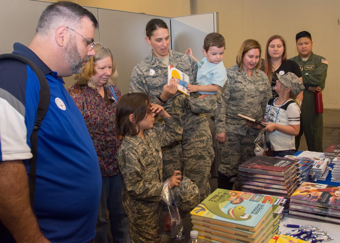 349th Air Mobility Wing Airmen and their family members participate in Operation Family Circle Aug. 12, 2017, at Travis Air Force Base, Calif.