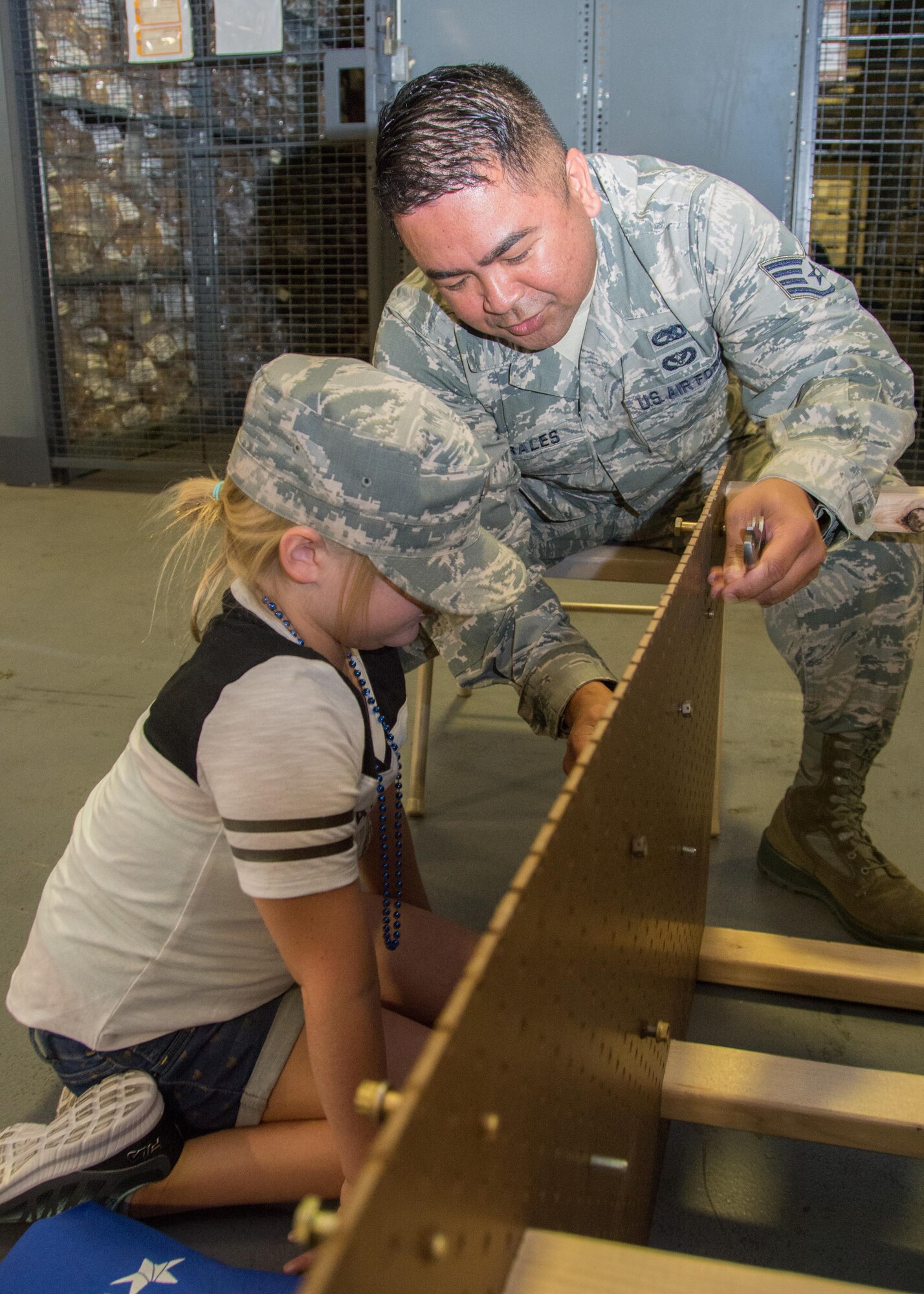 349th Air Mobility Wing Airmen and their family members participate in Operation Family Circle Aug. 12, 2017, at Travis Air Force Base, Calif.
