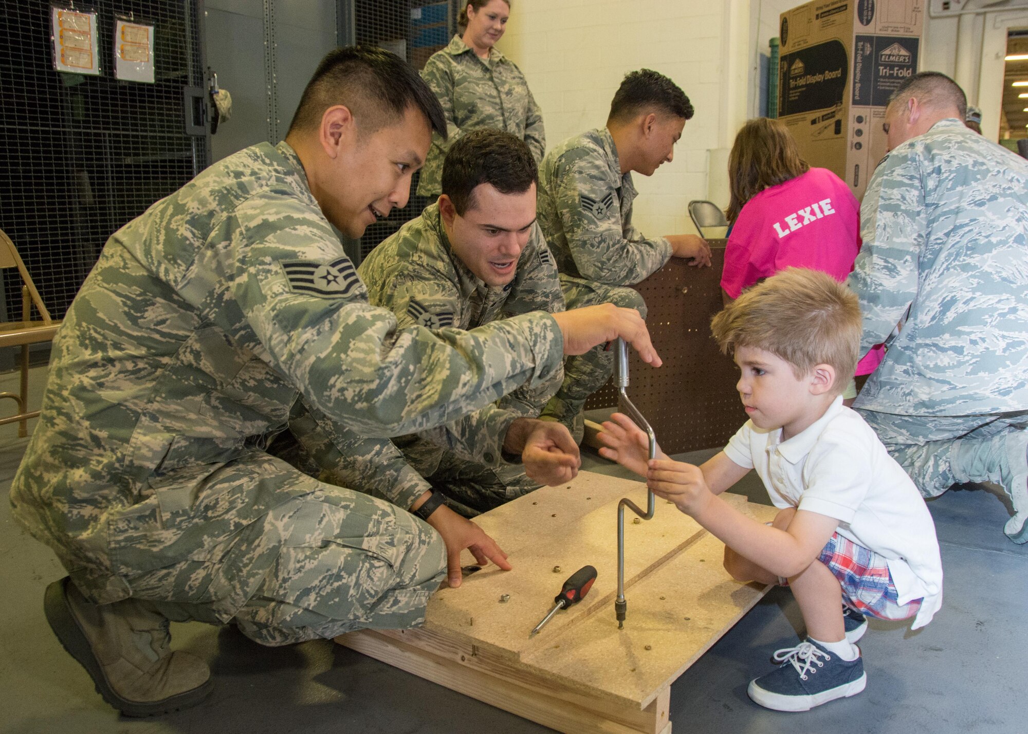 349th Air Mobility Wing Airmen and their family members participate in Operation Family Circle Aug. 12, 2017, at Travis Air Force Base, Calif.