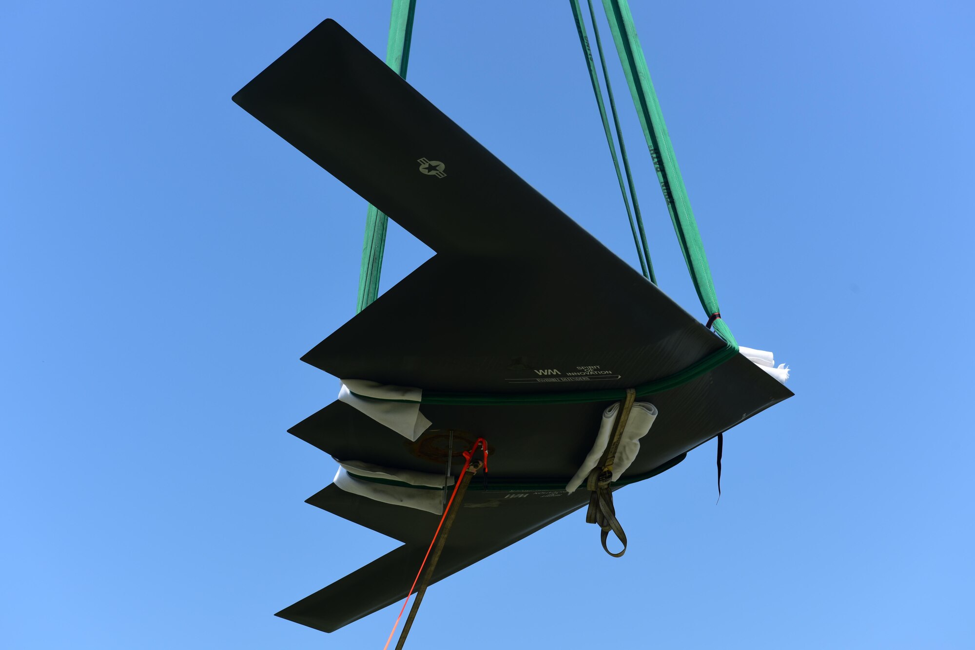 A U.S. Air Force B-2 Spirit replica is placed on display at Whiteman Air Force Base, Mo., Aug. 10, 2017. The B-2 display is 22 feet long, compared to the full size aircraft with a wingspan of 172 feet.