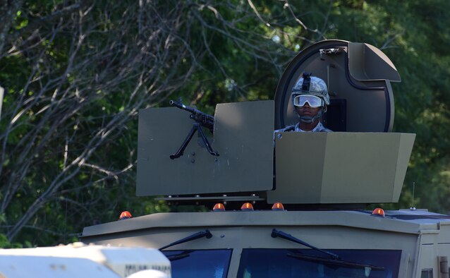 U.S. Air Force Airman 1st Class Tamia Sheegog, a 509th Security Forces Squadron (SFS) response team member, performs surveillance from a Bearcat’s turret at Whiteman Air Force Base, Mo., Aug. 4, 2017. SFS personnel are qualified on the M-240 machine gun, M-16 and M-4 rifle, M-9 Beretta and many other weapons to protect government assets and personnel.