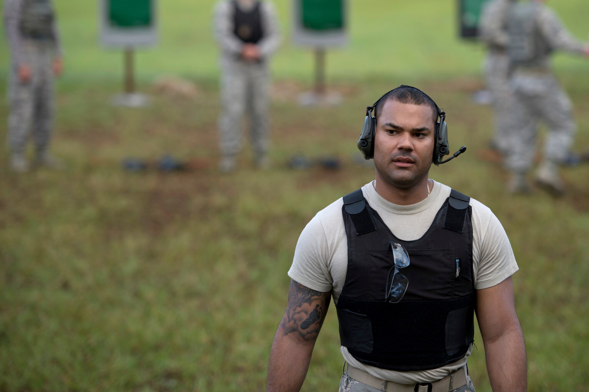 U.S Air Force Staff Sgt. Melvin Santos, a training instructor assigned to the 6th Security Forces Squadron, walks to the original firing line after showing his students how the firing proficiency exercise should be performed, Aug. 16, 2017 at MacDill Air Force Base, Fla.