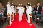 Capt. Gustavo Vergara center pictured arrives for his change of command ceremony.