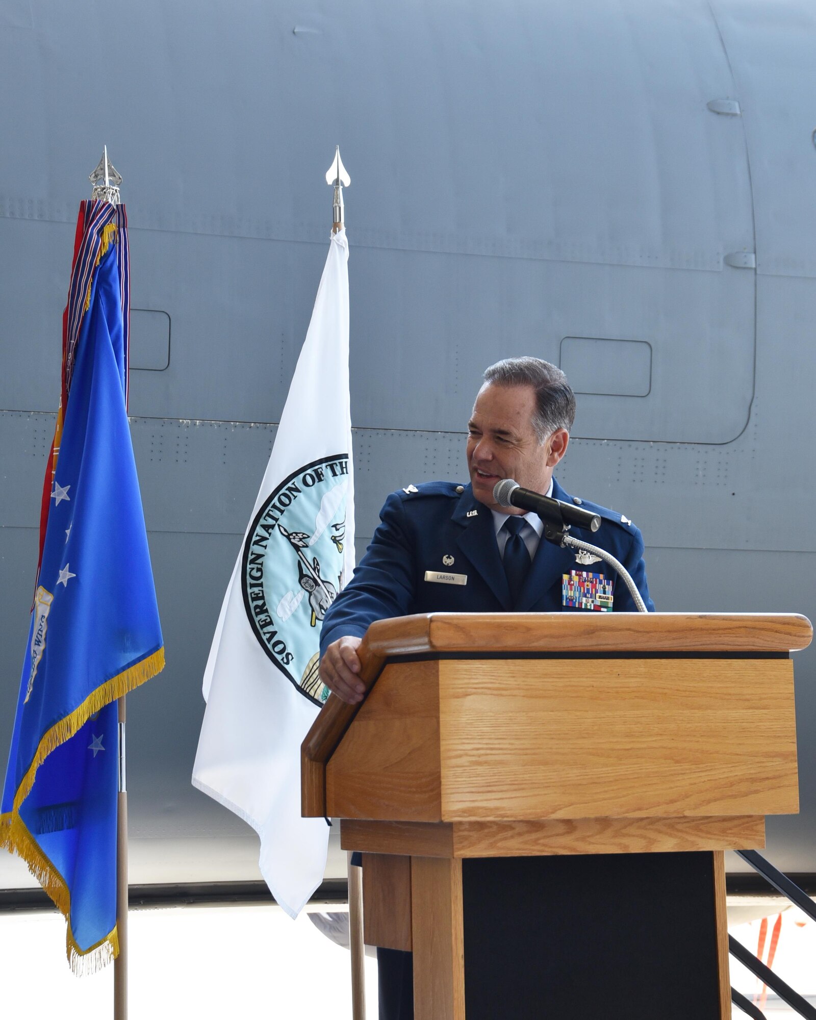 Col. Mark S. Larson, 931st Air Refueling Wing commander, speaks about the connection between the 931 ARW and the Kaw (Kanza) Nation during a ceremony, Aug 18, 2017, at McConnell Air Force Base, Kan.