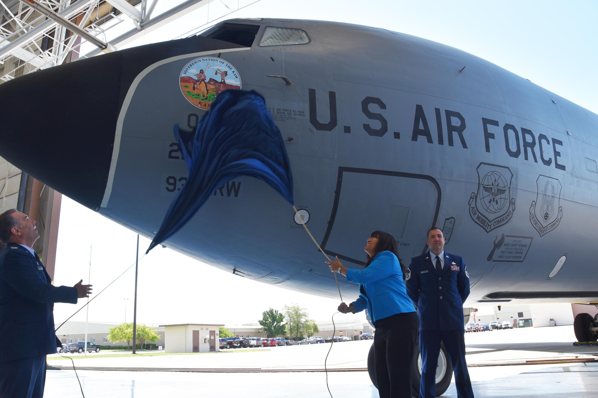 Col. Mark S. Larson, 931st Air Refueling Wing commander, and Ms. Jacque Secondine Hensley, the current Kaw Chair, reveal the official seal of the Kaw (Kanza) Nation on the nose of aircraft No. 58-0018, Aug. 18, 2017, at McConnell Air Force Base, Kan.  The 931 ARW’s roots with the Kaw stretch back to the wing’s introduction at McConnell as the 931st Air Refueling Group in 1995, as the first associate tanker unit in the Air Force.