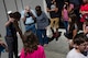 Master Sgt. Regina Rector, occupational safety manager with the 446th AW demonstrates how to use a cardboard tube modified to observe a solar eclipse. Rector, an amateur astronomer and a reserve citizen airman, gave a class at the McChord Library on Joint Base Lewis-McChord in preparation of the total solar eclipse on August 21, 2017.