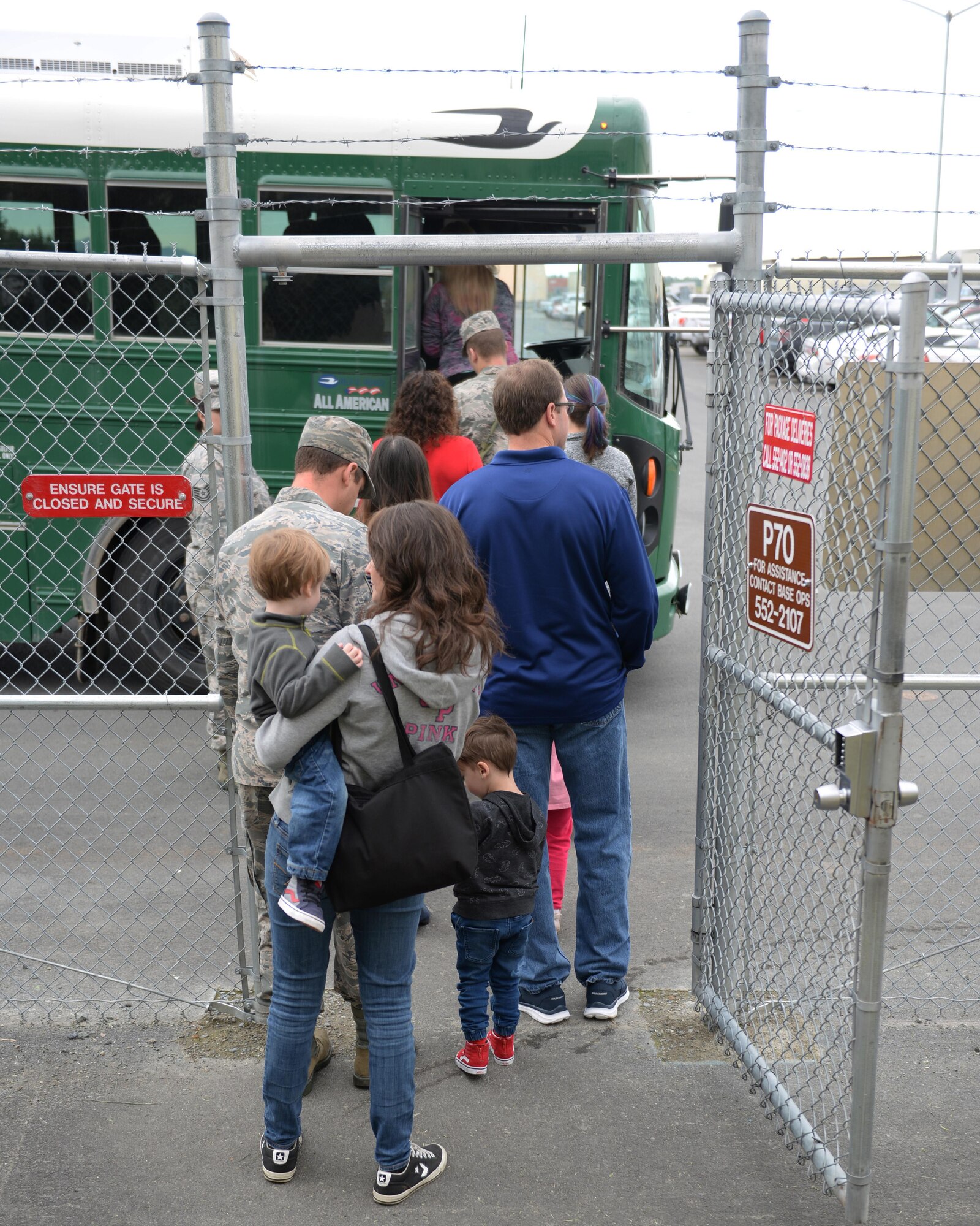A group of participants board a bus for the 3rd Munitions Squadrons’ second annual Family Orientation Day event Aug. 15 at Joint Base Elmendorf-Richardson, Alaska. This event offered family and friends of the 3rd MUNS a glimpse into the world of munitions as they traveled around JBER touring nine of the 13 worksites.