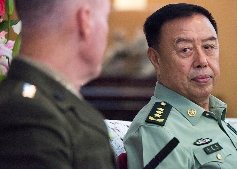 Joint Chief chairman talks with Chinese military leader.