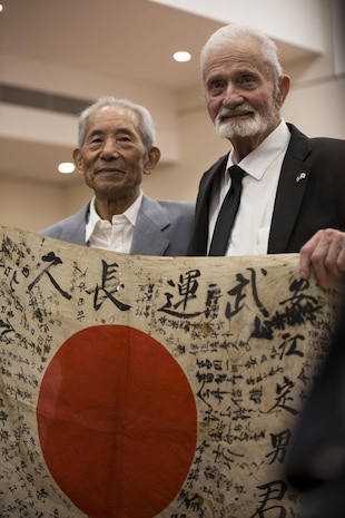 Marine returnes Japanese WWII flag to original family