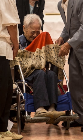 Marine returnes Japanese WWII flag to original family